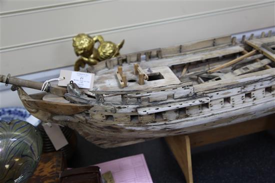 An 18th century wooden model of a thirty two gun Ship of The Line, length 3ft 2in.